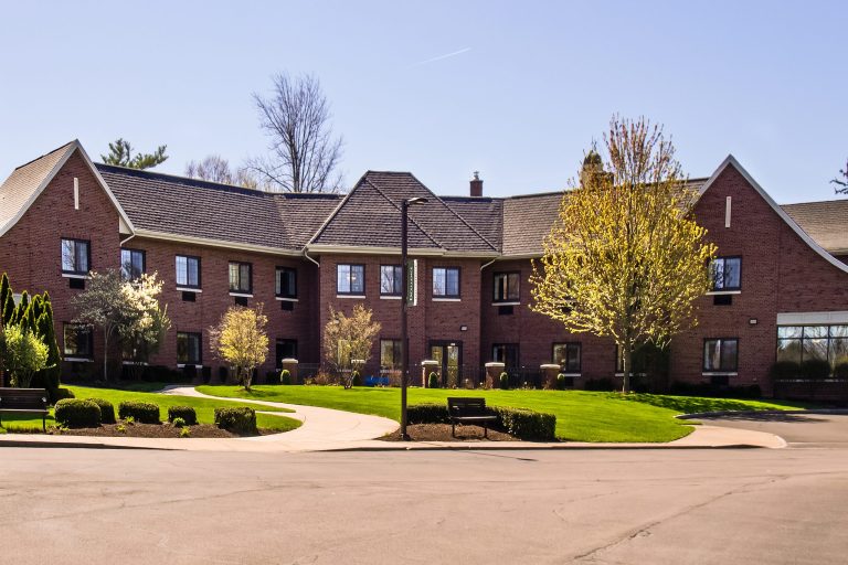 Retirement and assisted living facility on a beautiful spring day